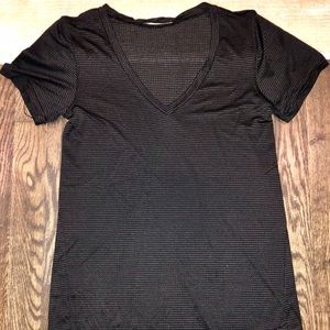 Sheen black and gold stripe/stitch lululemon top